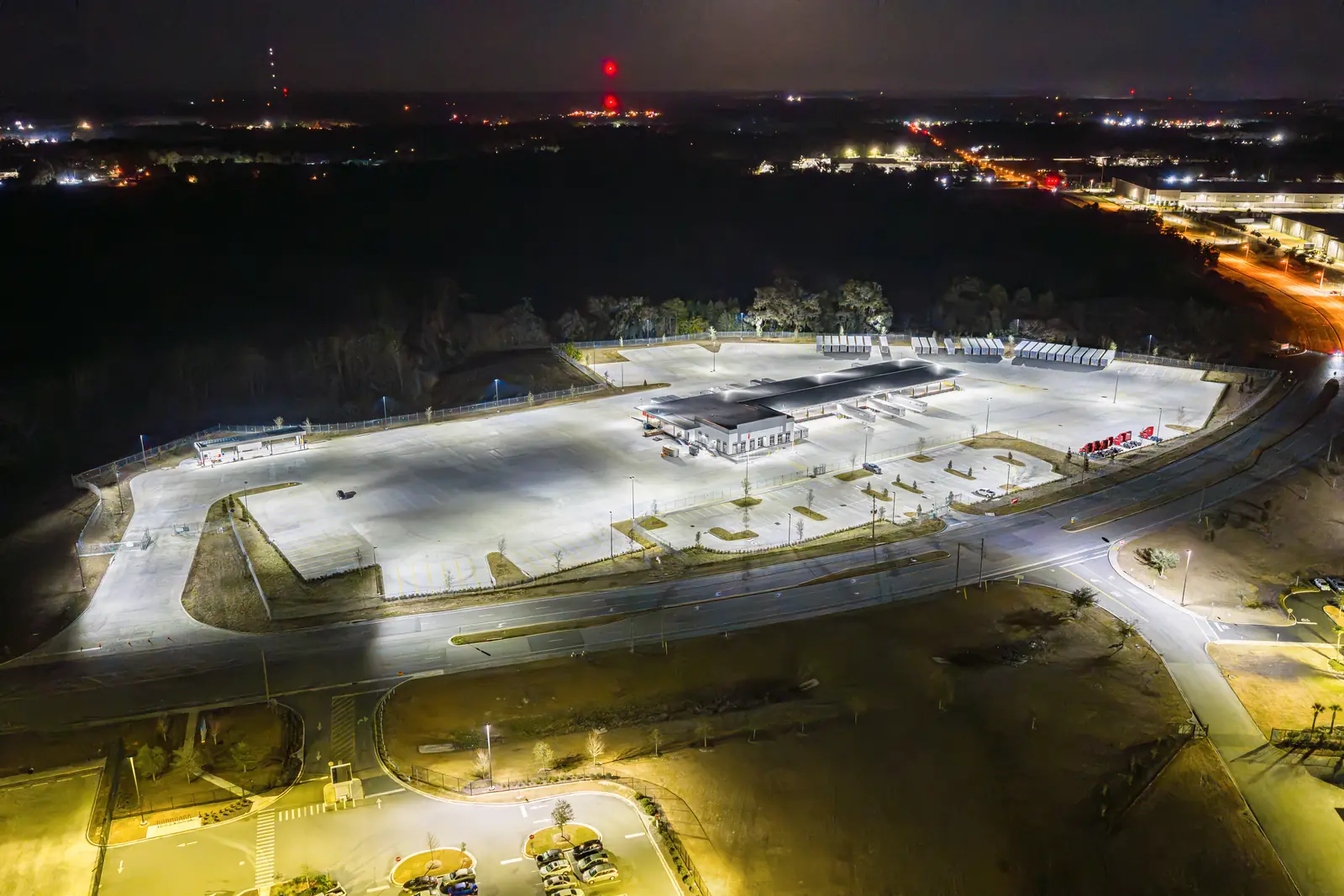 Aerial night photo of the completed Averitt cross-dock terminal and illuminated truck yard, Ocala Florida