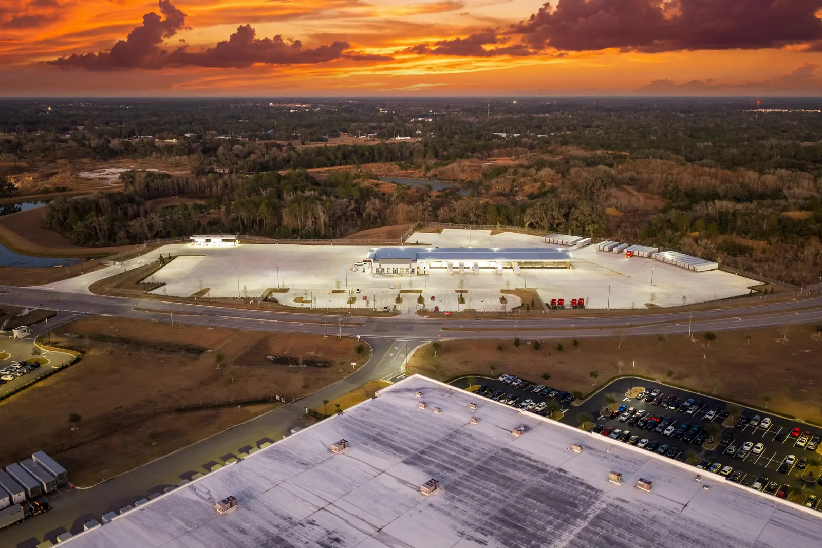 Drone photo of the Averitt trucking terminal at twilight, Marion County FL — completed 53-door cross-dock