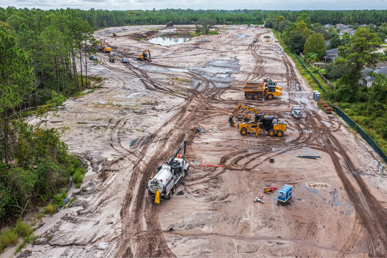 Drone construction site documentation of stormwater pond excavation and mass grading, St. Johns County FL