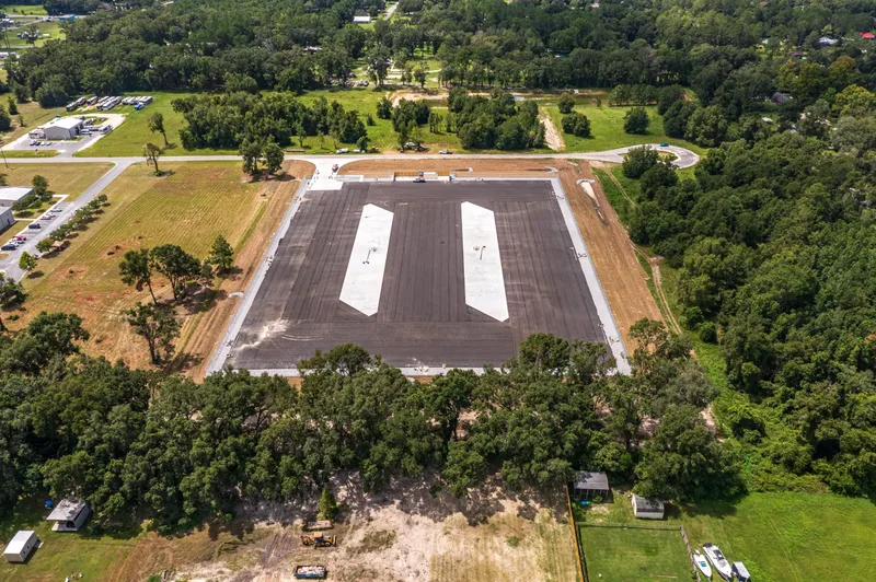 Aerial drone photo of a construction site in Lake City, FL — site overview and building progress, visit 12, July 2024