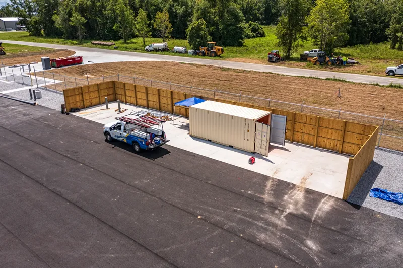 Aerial drone photo of a construction site in Lake City, FL — structural framing and earthwork, visit 12, July 2024