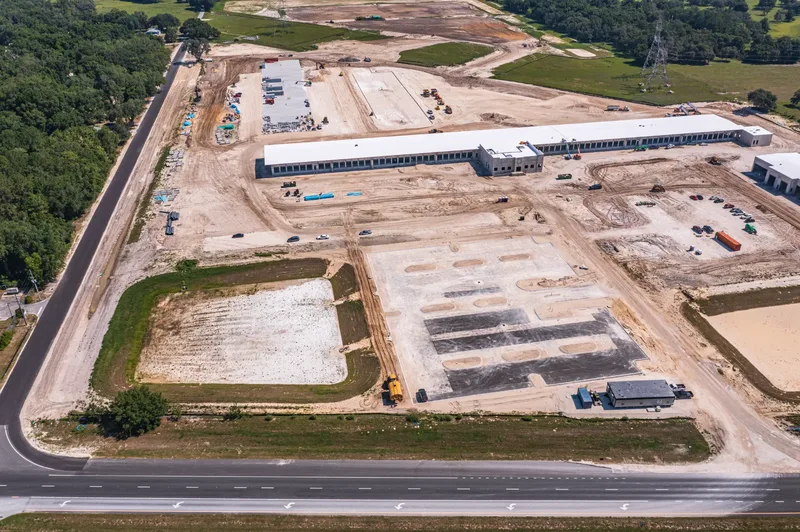Aerial drone photo of the Old Dominion Wildwood LTL terminal site — earthwork and grading progress, visit 17, May 2024