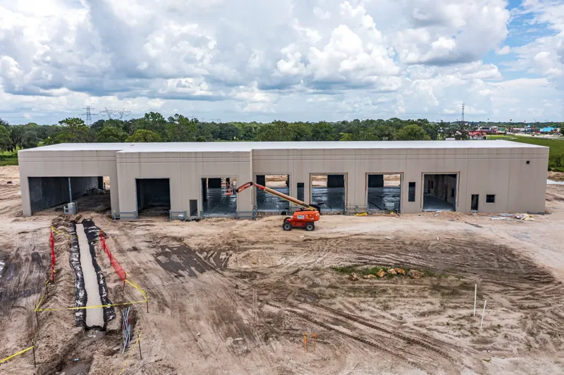 Aerial drone photo of the Old Dominion Wildwood LTL terminal construction — building footprint and earthwork, visit 21, July 2024